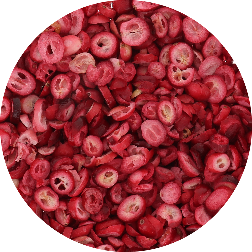 Close-up of dried red cranberries with a white background