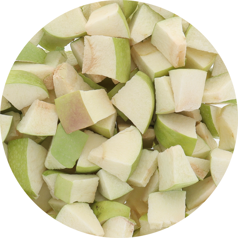 Diced green apples in a circular arrangement on a white background