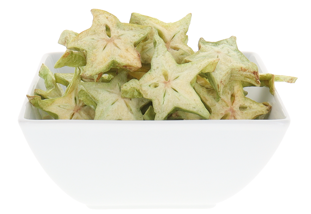 Star-shaped fruit pieces in a white bowl